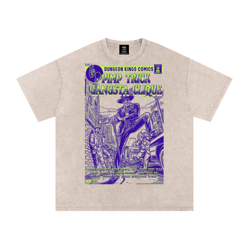 A light beige t-shirt featuring a vintage comic book cover graphic for 'Dungeon Kings Comics' with a purple and green 'Pimp Trick Gangsta Clique' illustration.