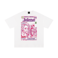 A white short-sleeve t-shirt with a colorful graphic print on the front. The graphic features a pink and purple comic-style illustration of Dolly Parton with the text 'Nashville Tennessee Jolene 1975' and 'WILD WEST'.
