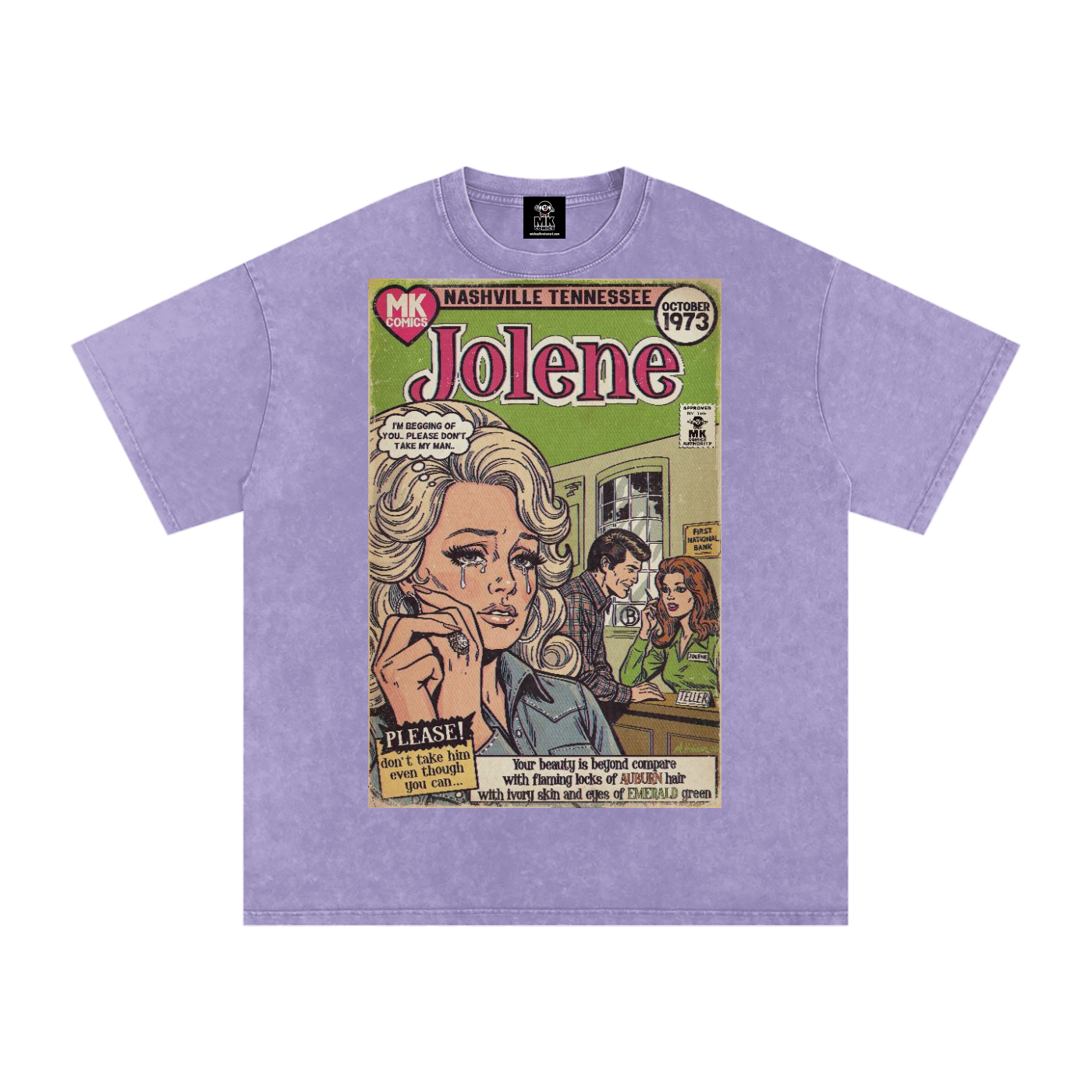 A light purple short-sleeve t-shirt featuring a large vintage-style comic book cover graphic of Dolly Parton on the front with the text 'MK Comics Jolene Nashville Tennessee 1973' and an illustrated scene.